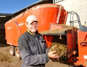 Farmer Matt Cleland with his Kuhn Euromix diet feeder at Glebe Farm